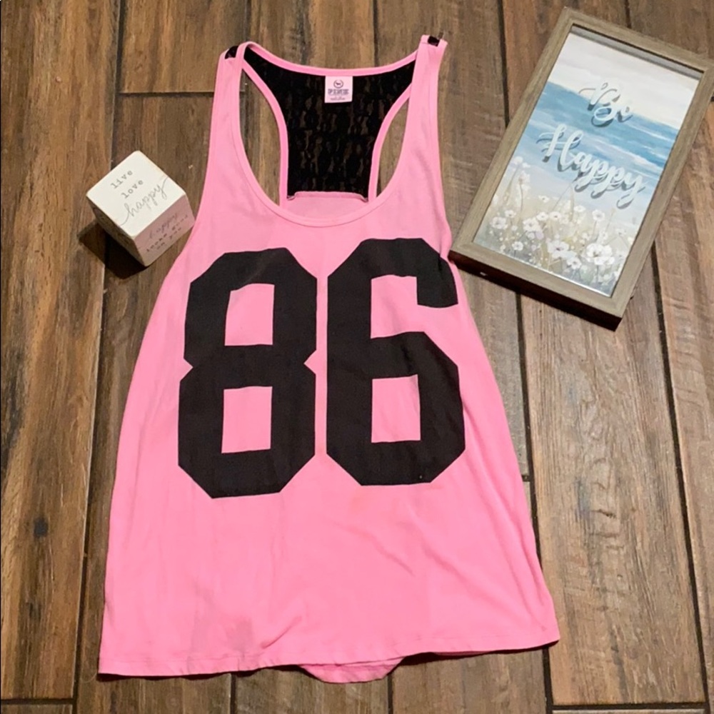 Victoria’s Secret pink tank with black lace.